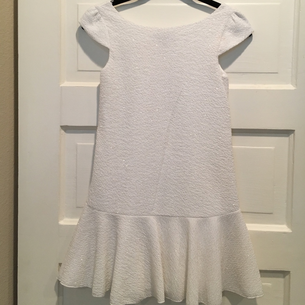 Girls white with gold sparkles party dress.